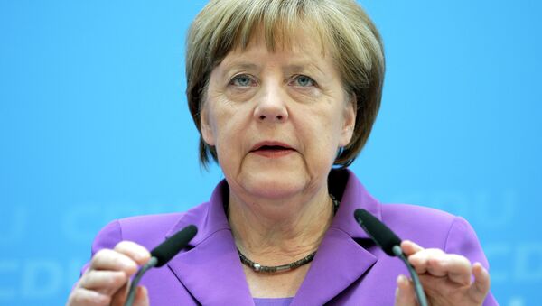 German Chancellor Angela Merkel has come out in defense of her staff, denying media reports that her administration lied about plans to reach a no-spying agreement with the United States. - Sputnik International