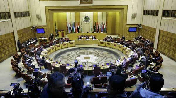 Representatives of the Arab League attend an emergency meeting to discuss the conflict in Libya, at the Arab League headquarters in Cairo, Egypt, Monday, Jan. 5, 2015. - Sputnik International