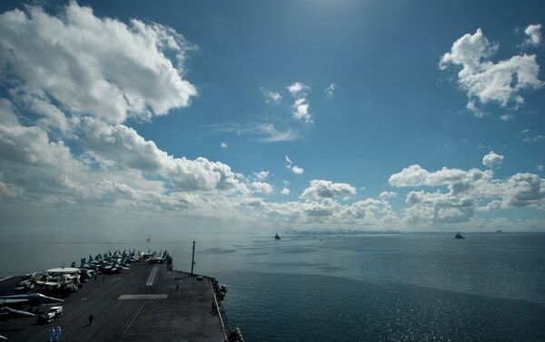 USS Carl Vinson (CVN 70) and ships from the Carl Vinson Carrier Strike Group anchor in Manila Bay. - Sputnik International