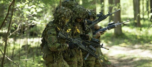 Estonian soldiers take part in an annual military exercise together with several units from other NATO member states - Sputnik International