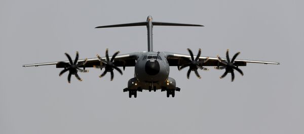 An Airbus A400M military plane flies before landing during a test flight at the airport of the Andalusian capital of Seville May 12, 2015 An Airbus A400M military plane flies before landing during a test flight at the airport of the Andalusian capital of Seville May 12, 2015 - Sputnik International