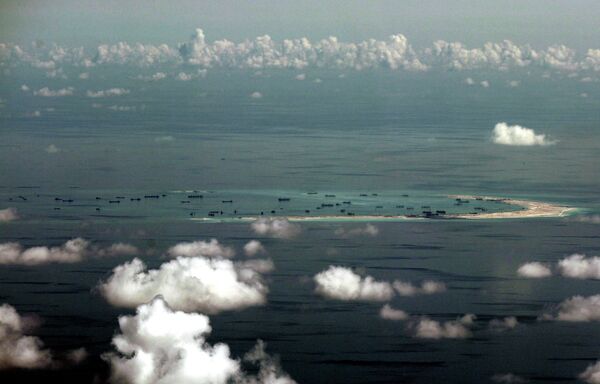 China's alleged on-going reclamation of Mischief Reef in the Spratly Islands. China's alleged on-going reclamation of Mischief Reef in the Spratly Islands. - Sputnik International