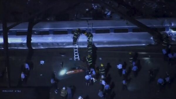 Aerial footage of first responders working at the scene of a train derailment in Philadephia, Pennslylania May 12, 2015 in this still image taken from footage by nbcphiladelphia.com - Sputnik International