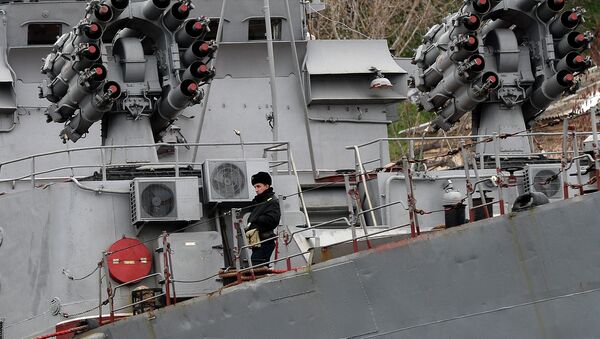 A Russian soldier stands on the Russian Black Sea Fleet Small Antisubmarine Warfare ship (ASW) Alexandrovets in the port of Sevastopol - Sputnik International