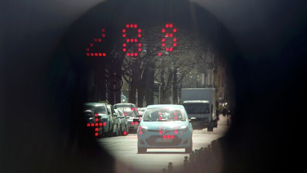 A car is pictured through the viewfinder of a police speed radar gun. - Sputnik International