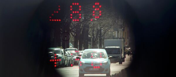 A car is pictured through the viewfinder of a police speed radar gun. A car is pictured through the viewfinder of a police speed radar gun. - Sputnik International