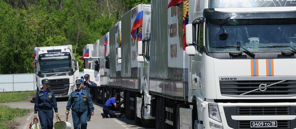 Humanitarian aid convoy in Rostov Region prepares to depart for southeastern Ukraine - Sputnik International