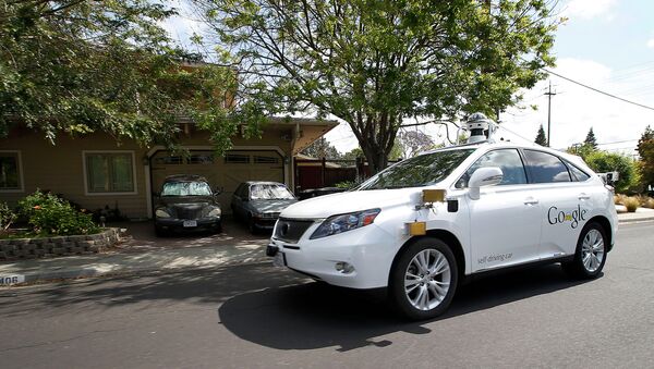 Google's self-driving Lexus car drives along street during a demonstration at Google campus on Wednesday, May 13, 2015, in Mountain View, Calif - Sputnik International