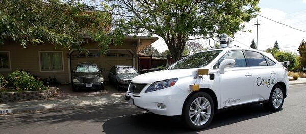 Google's self-driving Lexus car drives along street during a demonstration at Google campus on Wednesday, May 13, 2015, in Mountain View, Calif - Sputnik International