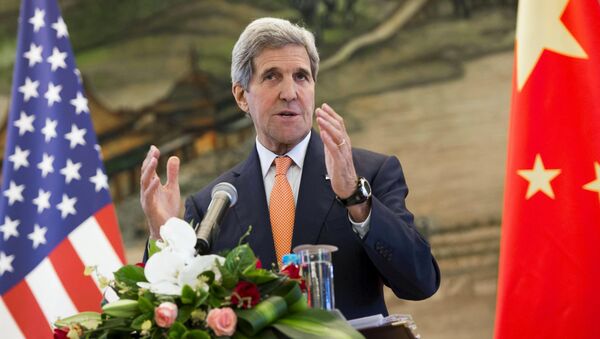 US Secretary of State John Kerry speaks during a joint news conference following meetings with Chinese Foreign Minister Wang Yi at the Ministry of Foreign Affairs in Beijing, China May 16, 2015 - Sputnik International