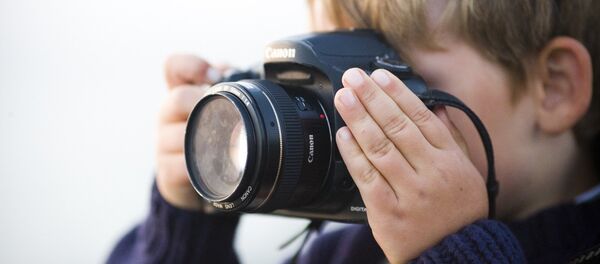 A boy with camera - Sputnik International
