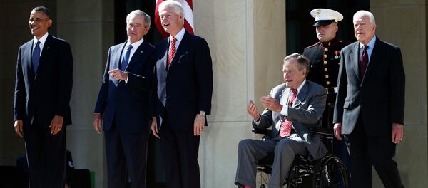 President Barack Obama stands with former presidents George W. Bush, Bill Clinton, George H.W. Bush, and Jimmy Carter. President Barack Obama stands with former presidents George W. Bush, Bill Clinton, George H.W. Bush, and Jimmy Carter. - Sputnik International