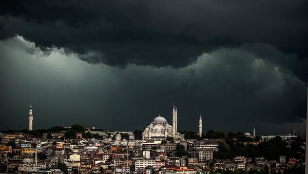 Clouds gather over the Suleymaniye Mosque (R) during a storm on August 7, 2014, in Istanbul - Sputnik International