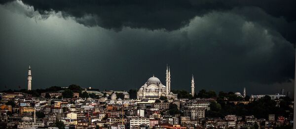 Clouds gather over the Suleymaniye Mosque (R) during a storm on August 7, 2014, in Istanbul Clouds gather over the Suleymaniye Mosque (R) during a storm on August 7, 2014, in Istanbul - Sputnik International