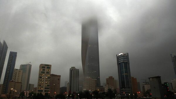 Clouds cover buildings in Kuwait City during a heavy rainfall - Sputnik International