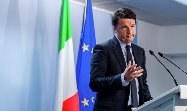 Italian Prime Minister Matteo Renzi speaks during a media conference after an emergency EU summit at the EU Council building in Brussels. Italian Prime Minister Matteo Renzi speaks during a media conference after an emergency EU summit at the EU Council building in Brussels. - Sputnik International