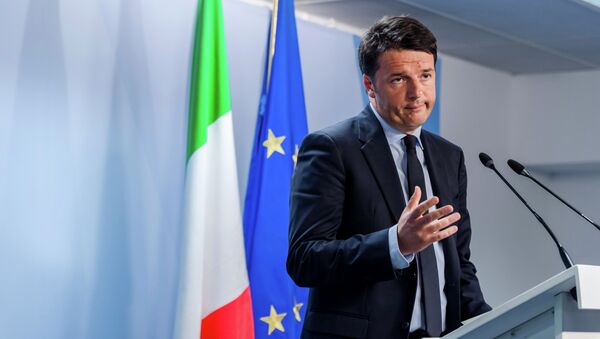 Italian Prime Minister Matteo Renzi speaks during a media conference after an emergency EU summit at the EU Council building in Brussels. - Sputnik International