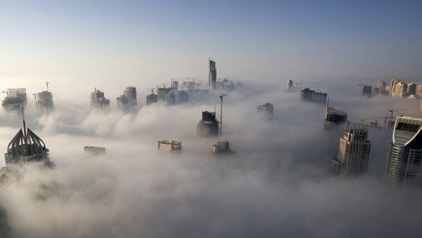 Heavy fog rolls by early in the morning near the Dubai Marina, United Arab Emirates - Sputnik International