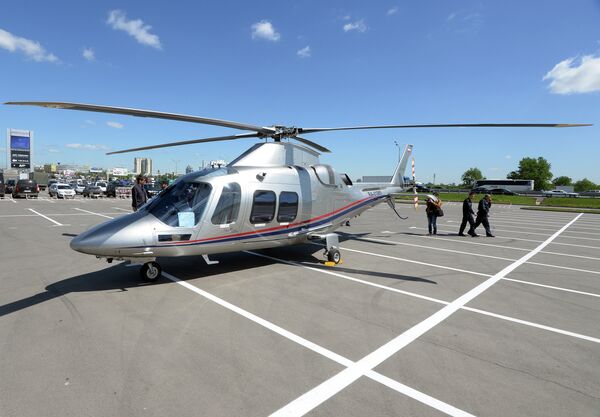 An Agusta AW109 helicopter by Moscow's Crocus Expo exhibition hall before the HeliRussia 2015 expo. An Agusta AW109 helicopter by Moscow's Crocus Expo exhibition hall before the HeliRussia 2015 expo. - Sputnik International