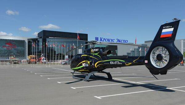 A Eurocopter EC-130T2 helicopter by Moscow's Crocus Expo exhibition hall before the HeliRussia 2015 expo. - Sputnik International