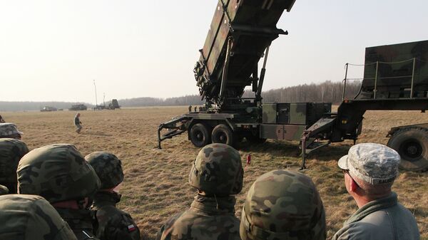 U.S. troops from 5th Battalion of the 7th Air Defense Regiment are seen at a test range in Sochaczew, Poland - Sputnik International