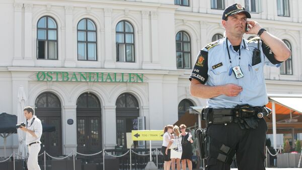 Armed police patrol at the Central railway station in Oslo - Sputnik International