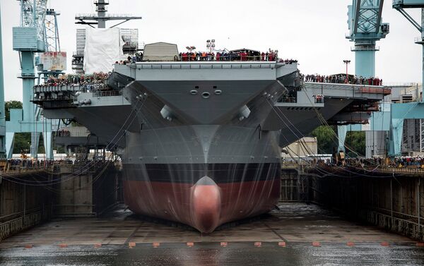 The estimated cost to the US Navy's second Ford-class aircraft carrier is already $370 million above a Congressionally mandated cap set for its construction after the USS Ford - pictured here - ran $2 billion over budget. - Sputnik International