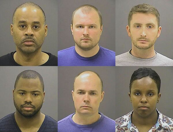 These undated photos provided by the Baltimore Police Department, show Baltimore police officers, top row from left, Caesar R. Goodson Jr., Garrett E. Miller and Edward M. Nero, and bottom row from left, William G. Porter, Brian W. Rice and Alicia D. White, charged with felonies ranging from assault to murder in the police-custody death of Freddie Gray. A grand jury indicted the six officers, State's Attorney Marilyn Mosby said Thursday, May 21, 2015. - Sputnik International