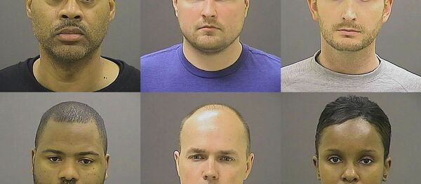 These undated photos provided by the Baltimore Police Department, show Baltimore police officers, top row from left, Caesar R. Goodson Jr., Garrett E. Miller and Edward M. Nero, and bottom row from left, William G. Porter, Brian W. Rice and Alicia D. White, charged with felonies ranging from assault to murder in the police-custody death of Freddie Gray. A grand jury indicted the six officers, State's Attorney Marilyn Mosby said Thursday, May 21, 2015. These undated photos provided by the Baltimore Police Department, show Baltimore police officers, top row from left, Caesar R. Goodson Jr., Garrett E. Miller and Edward M. Nero, and bottom row from left, William G. Porter, Brian W. Rice and Alicia D. White, charged with felonies ranging from assault to murder in the police-custody death of Freddie Gray. A grand jury indicted the six officers, State's Attorney Marilyn Mosby said Thursday, May 21, 2015. - Sputnik International