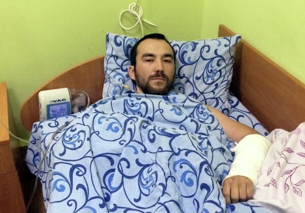 Captain Yevgeny Yerofeyev of the Russian special forces lies in a military hospital bed, in Kiev, Ukraine, Monday, May, 18, 2015 - Sputnik International