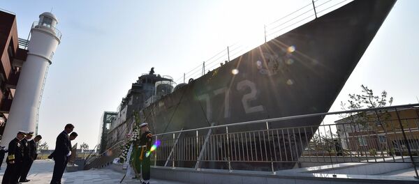U.S. Defense Secretary Ash Carter, fourth left, and his South Korean counterpart Han Min Koo, fifth left, pay a silent tribute for the late 46 sailors who died in the 2010 sinking of the South Korean naval vessel Cheonan at the memorial at a naval base in Pyeongtaek, 70 kilomters (44 miles) south of Seoul.file photo - Sputnik International