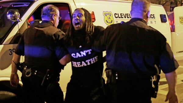 A protester is arrested after the acquittal of Michael Brelo, a patrolman charged in the shooting deaths of two unarmed suspects Saturday, May 23, 2015, in Cleveland - Sputnik International