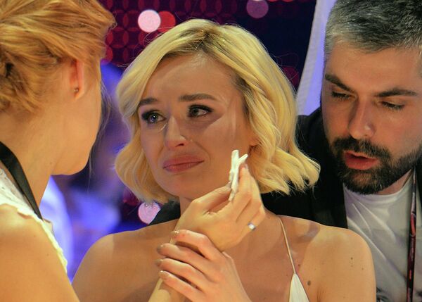 Polina Gagarina representing Russia, centre, reacts as the results start to come in during the final of the Eurovision Song Contest in Austria's capital Vienna, Saturday, May 23, 2015 Polina Gagarina representing Russia, centre, reacts as the results start to come in during the final of the Eurovision Song Contest in Austria's capital Vienna, Saturday, May 23, 2015 - Sputnik International