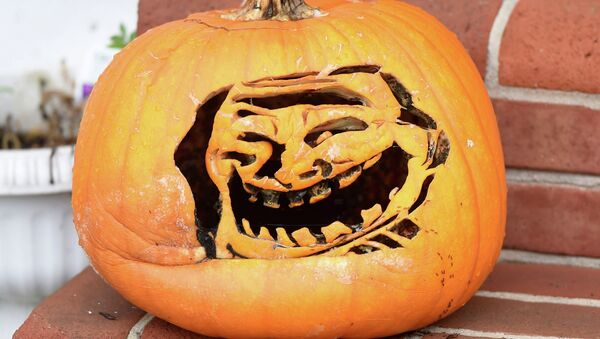 This pumpkin on Scotland Ave. in Chambersburg is carved into a popular internet troll face meme on Wednesday, October 15, 2014 - Sputnik International