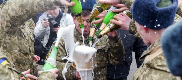 Former cadets of the military faculty of National Technical University pour champagne in northeastern Ukrainian city of Kharkiv Former cadets of the military faculty of National Technical University pour champagne in northeastern Ukrainian city of Kharkiv - Sputnik International