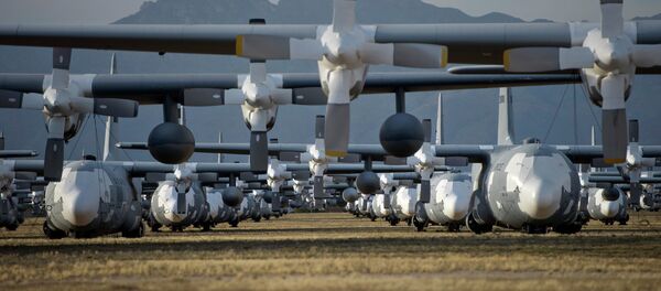C-130 Hercules cargo planes are lined up in a field at the 309th Aerospace Maintenance and Regeneration Group boneyard at Davis-Monthan Air Force Base in Tucson, Ariz C-130 Hercules cargo planes are lined up in a field at the 309th Aerospace Maintenance and Regeneration Group boneyard at Davis-Monthan Air Force Base in Tucson, Ariz - Sputnik International