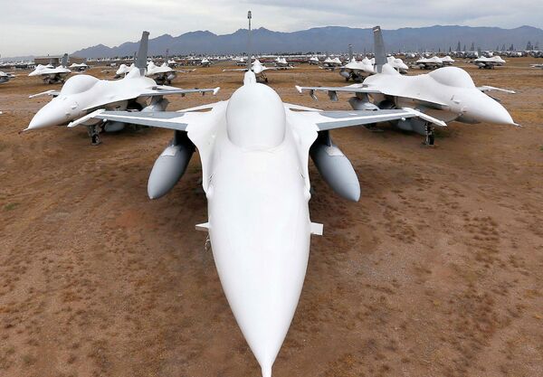 F-16 Fighting Falcons sit in a field along Miami St. at the 309th Aerospace Maintenance and Regeneration Group boneyard at Davis-Monthan Air Force Base in Tucson, Ariz F-16 Fighting Falcons sit in a field along Miami St. at the 309th Aerospace Maintenance and Regeneration Group boneyard at Davis-Monthan Air Force Base in Tucson, Ariz - Sputnik International