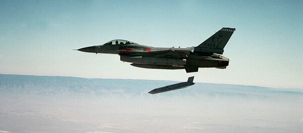 US Air Force file photo shows a Joint Air-to-Surface Standoff Missile (JASSM) fired during testing - Sputnik International