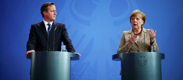 German Chancellor Angela Merkel and Britian's Prime Minister David Cameron address a joint news conference following a meeting at the Chancllery in Berlin, Germany German Chancellor Angela Merkel and Britian's Prime Minister David Cameron address a joint news conference following a meeting at the Chancllery in Berlin, Germany - Sputnik International