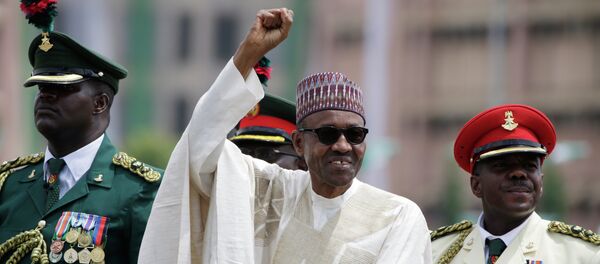 New Nigerian President, Muhammadu Buhari, salutes his supporters during his Inauguration in Abuja, Nigeria, Friday, May 29, 2015 New Nigerian President, Muhammadu Buhari, salutes his supporters during his Inauguration in Abuja, Nigeria, Friday, May 29, 2015 - Sputnik International