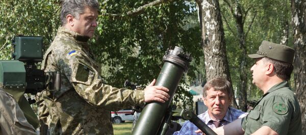Petro Poroshenko visits First operational brigade of National Guard near Kiev Petro Poroshenko visits First operational brigade of National Guard near Kiev - Sputnik International