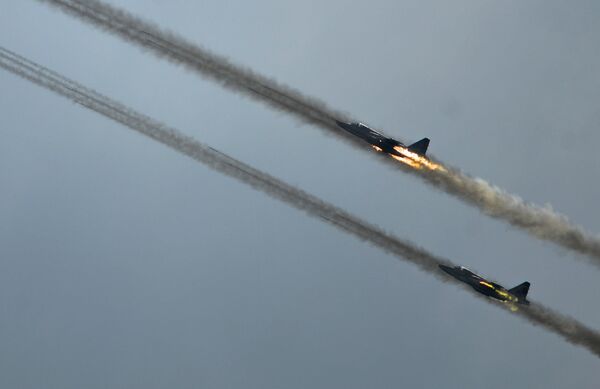 Sukhoi 25 jets during demo flights at the Russian stage of the Aviadarts-2015 Flight Skills Competition in Voronezh Sukhoi 25 jets during demo flights at the Russian stage of the Aviadarts-2015 Flight Skills Competition in Voronezh - Sputnik International