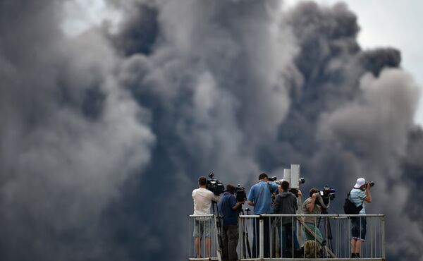 Journalists watch demo flights at the Russian stage of the Aviadarts-2015 Flight Skills Competition in Voronezh Journalists watch demo flights at the Russian stage of the Aviadarts-2015 Flight Skills Competition in Voronezh - Sputnik International