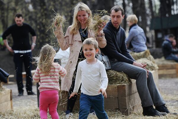 A family at the Central Gorky Park, Moscow A family at the Central Gorky Park, Moscow - Sputnik International