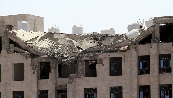 The Yemeni Football Association building, which was damaged in a Saudi-led air strike, is seen in Sanaa May 31, 2015. Aircraft from a Saudi-led coalition bombed Yemen's Houthi rebels throughout the country on Sunday, residents said, a day after border clashes killed a Saudi serviceman - Sputnik International
