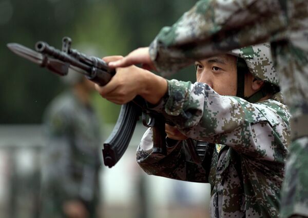 Chinese People's Liberation Army cadets take part in a bayonet drills at the PLA's Armoured Forces Engineering Academy Base Chinese People's Liberation Army cadets take part in a bayonet drills at the PLA's Armoured Forces Engineering Academy Base - Sputnik International