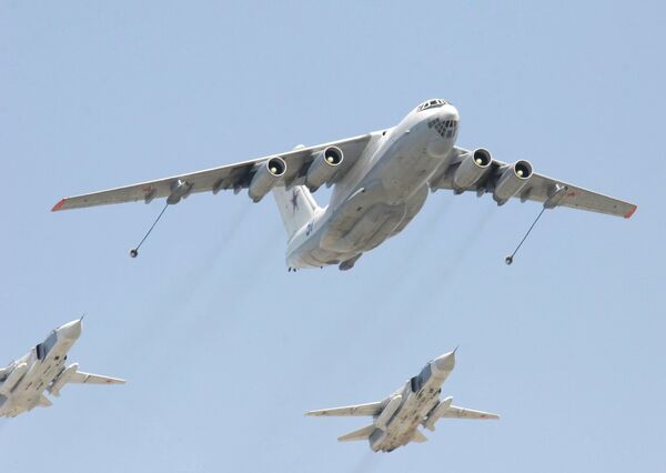 An Il-78 tanker aircraft and Su-24 fighter-bombers. An Il-78 tanker aircraft and Su-24 fighter-bombers. - Sputnik International