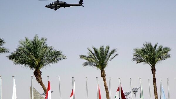 An Egyptian army helicopter patrols the venue of a meeting of Arab heads of state, in Sharm el Sheik, South Sinai, Egypt, Saturday, March 28, 2015 - Sputnik International