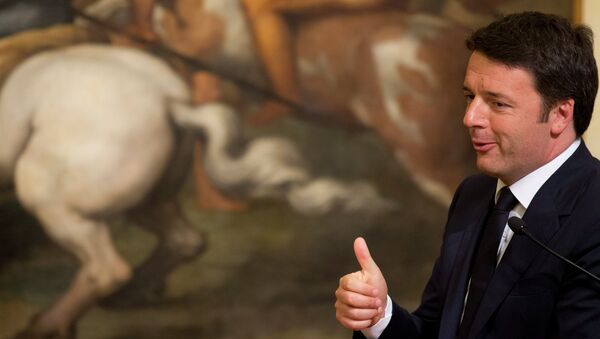 Italian premier Matteo Renzi gives a thumbs-up during a ceremony at Rome's Palazzo Chigi Government office - Sputnik International
