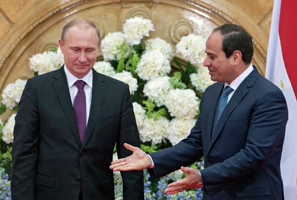 February 10, 2015. President Vladimir Putin (left) and his Egyptian counterpart Abdel Fattah al-Sisi make a joint statement for the press on the results of Russian-Egyptian talks in Cairo - Sputnik International